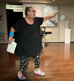 A woman acting on stage