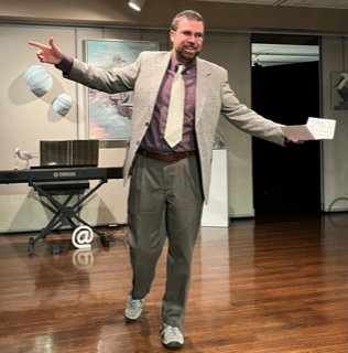 A man in a suit skipping