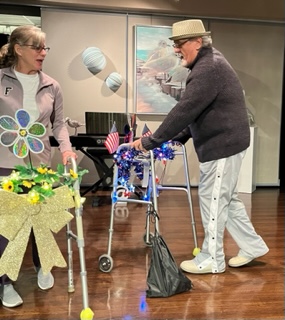 A man and woman with walkers