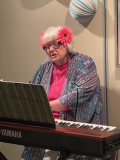 A woman playing the piano