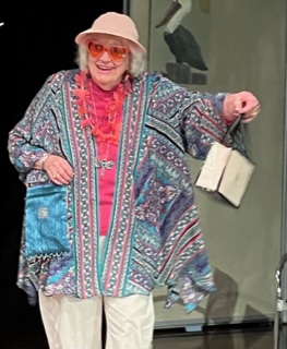A woman carrying a shopping bag